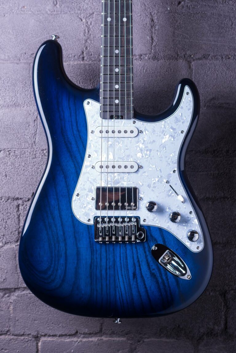 Classic-S-22726-Blue-burst-body-guitar-brick-background
