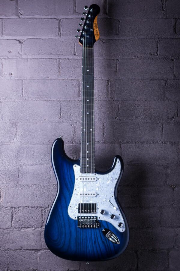 Classic S 22726 Blue burst full guitar brick background