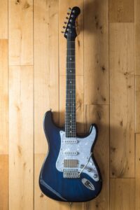 Classic S 22726 Blue burst full guitar wood background