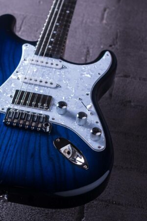 Classic-S-22726-Blue-burst-laid-down-guitar-brick-background