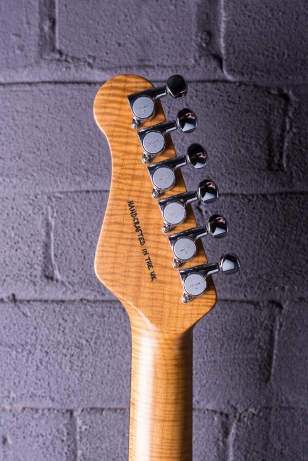 Classic-S-22726-Blue-burst-reverse-headstock-guitar-brick-background