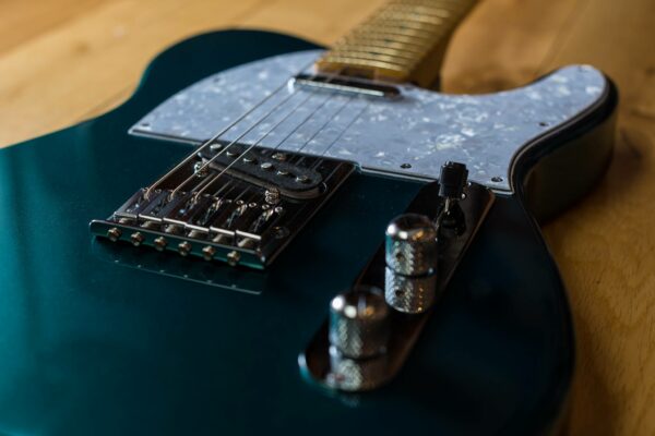 Classic T - Rockingham Green - Laid down Guitar - Wood Background