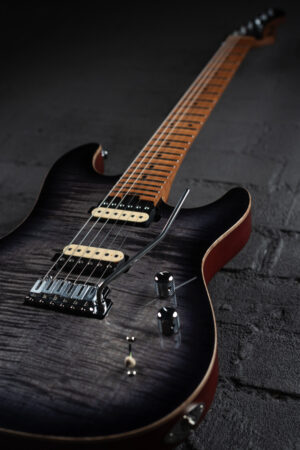 Geist electric guitar by Gordon Smith. Carbon finish. Long image.