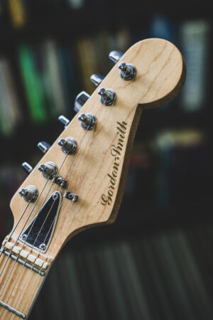 Pre 2015 GS headstock decals shown on Gordon Smith head